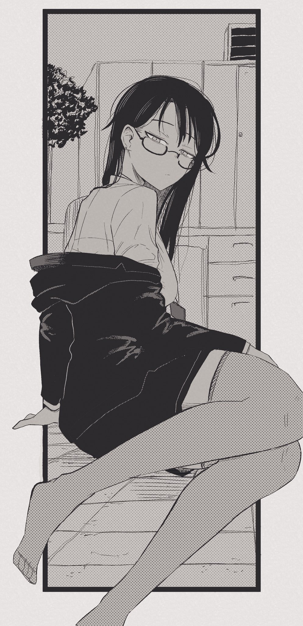 Monochrome image of a tired looking office lady